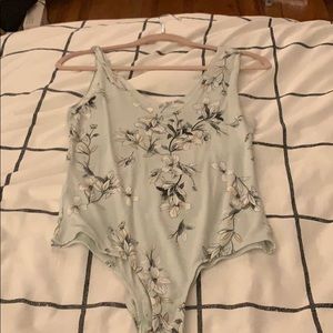 Body suit with floral design